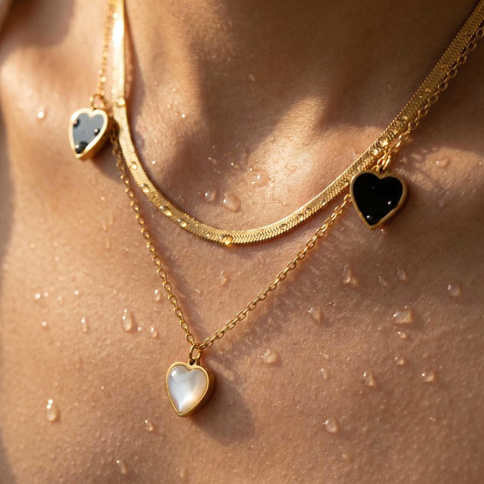 Macro of a gold-plated symbol pendant on warm skin with a few water droplets, everyday wear