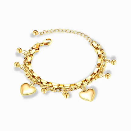 Glozya 18K Gold Plated Layered Heart Bracelet featuring multiple gold-plated chains, heart charms, and an adjustable extension clasp.